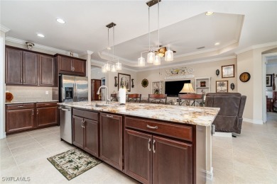 This stunning 4-bedroom plus den home is a rare find, offering on Herons Glen Golf and Country Club in Florida - for sale on GolfHomes.com, golf home, golf lot