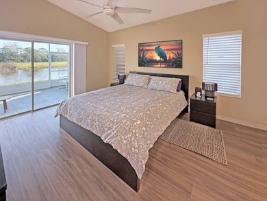 Beautifully renovated villa with golf course and lake views! on The Great Outdoors Golf and Country Club in Florida - for sale on GolfHomes.com, golf home, golf lot