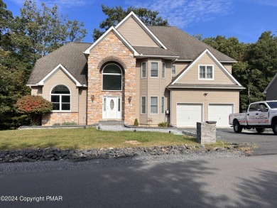 Discover this stunning, newly renovated 4-bedroom, 2.5-bath on Country Club of the Poconos Golf Course in Pennsylvania - for sale on GolfHomes.com, golf home, golf lot