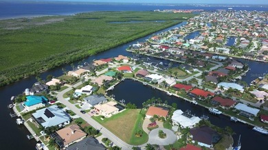 WATERFRONT LOT IN PUNTA GORDA ISLES! Sailboat water, just on Saint Andrews South Golf Club in Florida - for sale on GolfHomes.com, golf home, golf lot