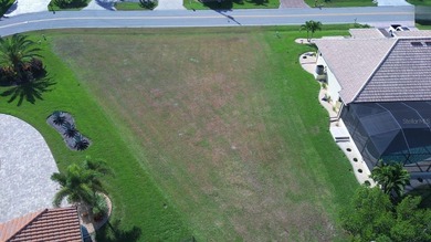 WATERFRONT LOT IN PUNTA GORDA ISLES! Sailboat water, just on Saint Andrews South Golf Club in Florida - for sale on GolfHomes.com, golf home, golf lot