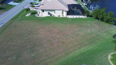 WATERFRONT LOT IN PUNTA GORDA ISLES! Sailboat water, just on Saint Andrews South Golf Club in Florida - for sale on GolfHomes.com, golf home, golf lot