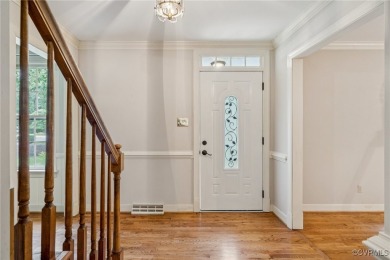 Situated on a wooded .71-acre lot in the heart of Midlothian on Salisbury Country Club in Virginia - for sale on GolfHomes.com, golf home, golf lot