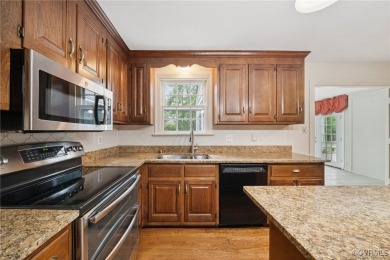 Situated on a wooded .71-acre lot in the heart of Midlothian on Salisbury Country Club in Virginia - for sale on GolfHomes.com, golf home, golf lot