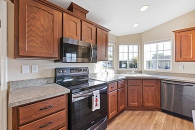 Come see this sweet 2 bedroom 2 bath cutie. No carpet, stainless on Augusta Ranch Golf Club in Arizona - for sale on GolfHomes.com, golf home, golf lot