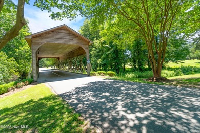 READY FOR SPRING 2026! Situated on one of the most photographed on Sound Golf Links at Albemarle Plantation in North Carolina - for sale on GolfHomes.com, golf home, golf lot