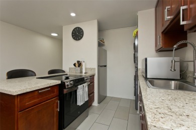 Large corner unit. Bright, Breezy. Ala Wai Canal, Mountain, Golf on Ala Wai Golf Course in Hawaii - for sale on GolfHomes.com, golf home, golf lot