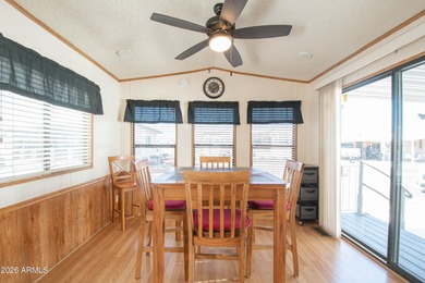 This cute home is located in Carriage Manor Resort, a premier on Fountain of the Sun Country Club in Arizona - for sale on GolfHomes.com, golf home, golf lot