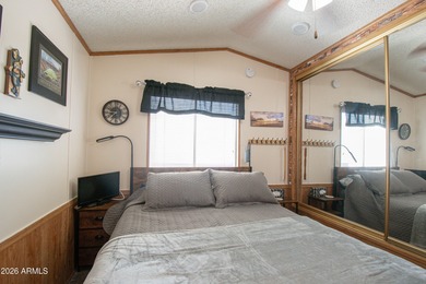 This cute home is located in Carriage Manor Resort, a premier on Fountain of the Sun Country Club in Arizona - for sale on GolfHomes.com, golf home, golf lot