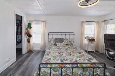 This beautifully updated home in the 55+ waterfront community of on Apollo Beach Golf and Sea Club in Florida - for sale on GolfHomes.com, golf home, golf lot