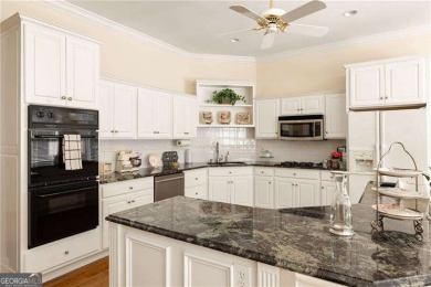 Tucked away in The Highlands at White Oak, this stately home on Canongate On White Oak Golf Course in Georgia - for sale on GolfHomes.com, golf home, golf lot