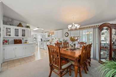 Welcome to this cozy and beautifully maintained 3 bedroom, 2 on Kings Gate Golf Club in Florida - for sale on GolfHomes.com, golf home, golf lot