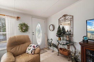 Welcome to this cozy and beautifully maintained 3 bedroom, 2 on Kings Gate Golf Club in Florida - for sale on GolfHomes.com, golf home, golf lot