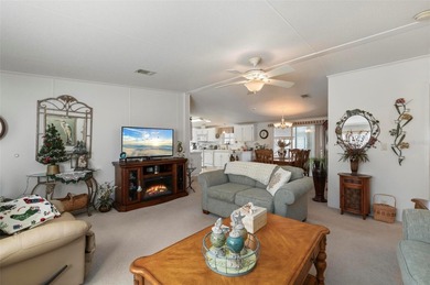 Welcome to this cozy and beautifully maintained 3 bedroom, 2 on Kings Gate Golf Club in Florida - for sale on GolfHomes.com, golf home, golf lot