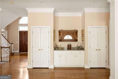 Tucked away in The Highlands at White Oak, this stately home on Canongate On White Oak Golf Course in Georgia - for sale on GolfHomes.com, golf home, golf lot