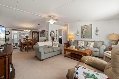 Welcome to this cozy and beautifully maintained 3 bedroom, 2 on Kings Gate Golf Club in Florida - for sale on GolfHomes.com, golf home, golf lot