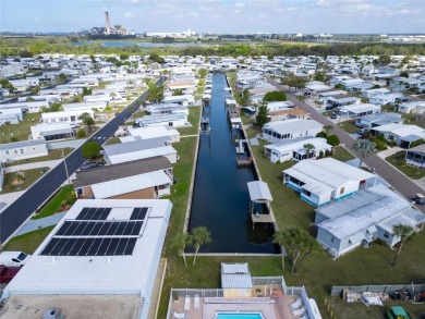 This beautifully updated home in the 55+ waterfront community of on Apollo Beach Golf and Sea Club in Florida - for sale on GolfHomes.com, golf home, golf lot