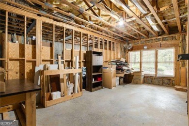 Tucked away in The Highlands at White Oak, this stately home on Canongate On White Oak Golf Course in Georgia - for sale on GolfHomes.com, golf home, golf lot