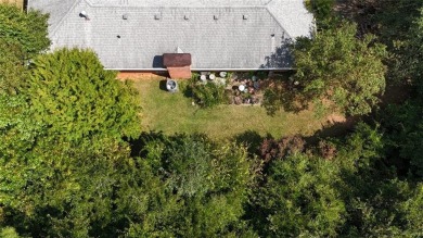 Incredible Opportunity Large Four-Side Brick Ranch Sitting on on West Pines Golf Club in Georgia - for sale on GolfHomes.com, golf home, golf lot