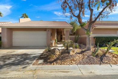 The charming courtyard gracefully lures you into this spacious on Oasis Country Club in California - for sale on GolfHomes.com, golf home, golf lot