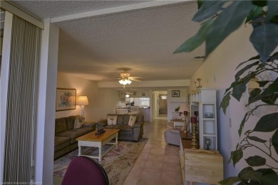 Enjoy maintenance-free living in this beautifully furnished on  in Florida - for sale on GolfHomes.com, golf home, golf lot