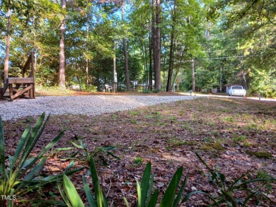 PRIME LOCATION FOR THE PERFECT GET-AWAY AT LAKE ROYALE!! Just on River Golf and Country Club at Lake Royale in North Carolina - for sale on GolfHomes.com, golf home, golf lot
