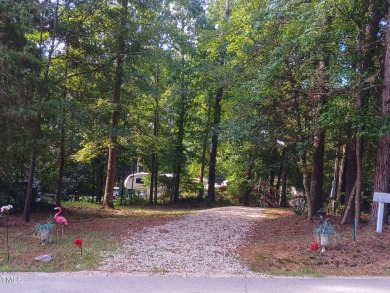 PRIME LOCATION FOR THE PERFECT GET-AWAY AT LAKE ROYALE!! Just on River Golf and Country Club at Lake Royale in North Carolina - for sale on GolfHomes.com, golf home, golf lot