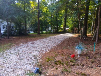 PRIME LOCATION FOR THE PERFECT GET-AWAY AT LAKE ROYALE!! Just on River Golf and Country Club at Lake Royale in North Carolina - for sale on GolfHomes.com, golf home, golf lot