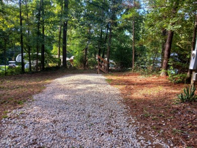 PRIME LOCATION FOR THE PERFECT GET-AWAY AT LAKE ROYALE!! Just on River Golf and Country Club at Lake Royale in North Carolina - for sale on GolfHomes.com, golf home, golf lot