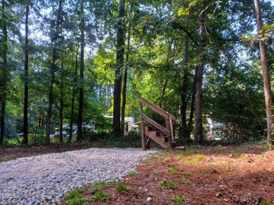 PRIME LOCATION FOR THE PERFECT GET-AWAY AT LAKE ROYALE!! Just on River Golf and Country Club at Lake Royale in North Carolina - for sale on GolfHomes.com, golf home, golf lot