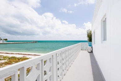 Live as though you're on a tranquil vacation every day in this on Key Colony Beach Golf Course in Florida - for sale on GolfHomes.com, golf home, golf lot