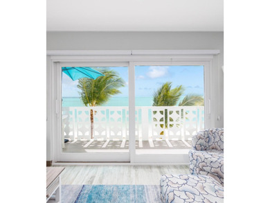 Live as though you're on a tranquil vacation every day in this on Key Colony Beach Golf Course in Florida - for sale on GolfHomes.com, golf home, golf lot