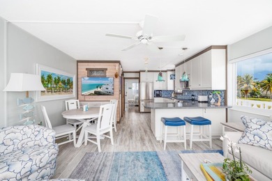 Live as though you're on a tranquil vacation every day in this on Key Colony Beach Golf Course in Florida - for sale on GolfHomes.com, golf home, golf lot