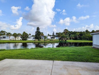 This beautiful RV lot with lake view is ready to a covered port on The Great Outdoors Golf and Country Club in Florida - for sale on GolfHomes.com, golf home, golf lot