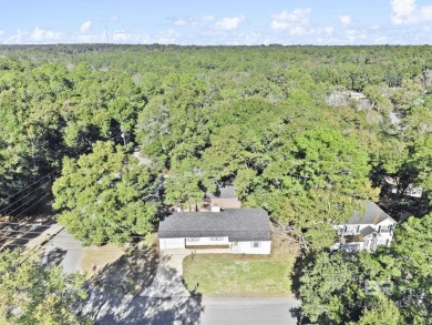 Welcome to this beautifully updated ranch home in the desirable on Lake Forest Yacht and Country Club in Alabama - for sale on GolfHomes.com, golf home, golf lot