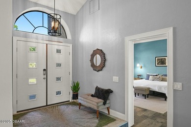 FULLY FURNISHED 5 bedroom 4 bathroom luxurious pool home sits in on Spruce Creek Golf Club in Florida - for sale on GolfHomes.com, golf home, golf lot