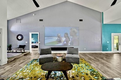 FULLY FURNISHED 5 bedroom 4 bathroom luxurious pool home sits in on Spruce Creek Golf Club in Florida - for sale on GolfHomes.com, golf home, golf lot