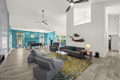 FULLY FURNISHED 5 bedroom 4 bathroom luxurious pool home sits in on Spruce Creek Golf Club in Florida - for sale on GolfHomes.com, golf home, golf lot