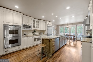 This exceptional home is nestled on a peaceful and private 1 on North Fulton Golf Course in Georgia - for sale on GolfHomes.com, golf home, golf lot