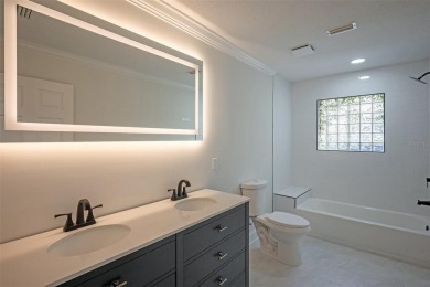Welcome to your dream home in the sought-after, gated community on Queens Harbour Yacht and Country Club in Florida - for sale on GolfHomes.com, golf home, golf lot