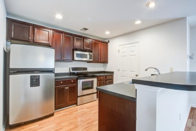 This spacious 4-bedroom, 2.5-bath townhome offers over 1,750 on Golf Club At Wescott Plantation in South Carolina - for sale on GolfHomes.com, golf home, golf lot