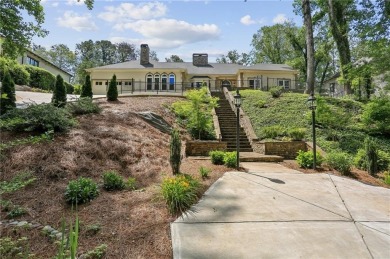 Tucked in Atlanta Country Club's quiet interior, this European on Atlanta Country Club in Georgia - for sale on GolfHomes.com, golf home, golf lot