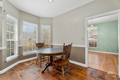 This classic Southern house sits on a corner lot in the heart of on Lake Forest Yacht and Country Club in Alabama - for sale on GolfHomes.com, golf home, golf lot