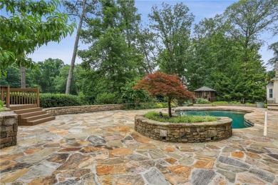 Tucked in Atlanta Country Club's quiet interior, this European on Atlanta Country Club in Georgia - for sale on GolfHomes.com, golf home, golf lot