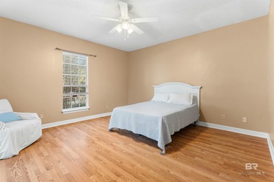 This classic Southern house sits on a corner lot in the heart of on Lake Forest Yacht and Country Club in Alabama - for sale on GolfHomes.com, golf home, golf lot