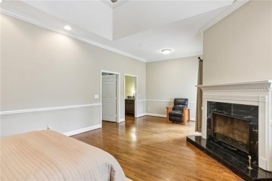 Tucked in Atlanta Country Club's quiet interior, this European on Atlanta Country Club in Georgia - for sale on GolfHomes.com, golf home, golf lot