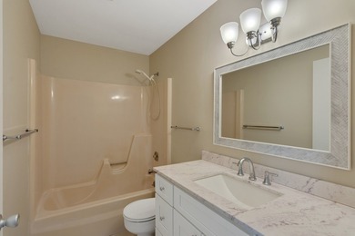 Beautifully updated first-floor unit with golf views! Desirable on The American Golf Club in Florida - for sale on GolfHomes.com, golf home, golf lot