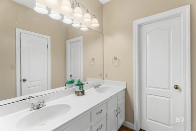 This classic Southern house sits on a corner lot in the heart of on Lake Forest Yacht and Country Club in Alabama - for sale on GolfHomes.com, golf home, golf lot