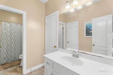 This classic Southern house sits on a corner lot in the heart of on Lake Forest Yacht and Country Club in Alabama - for sale on GolfHomes.com, golf home, golf lot