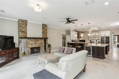 Tucked in Atlanta Country Club's quiet interior, this European on Atlanta Country Club in Georgia - for sale on GolfHomes.com, golf home, golf lot